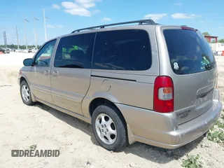 2002 Oldsmobile Silhouette GL z VIN 1GHDX03E72D180250, wystawiony jako IAAI lot #42026058 z przebiegiem 131 618 mil mil oraz . Historia ofert i sprzedaży dostępna na DreamBid. Obrazek 3.