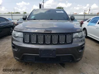 2018 Jeep Grand Cherokee Laredo E with VIN 1C4RJFAG6JC387334, listed as a Copart auction lot 64197034 with 57,992 mi miles and Salvage Title. Bid and sale history available at carsss.com. Image 5.