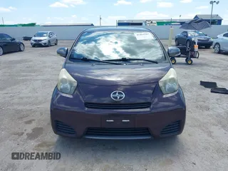 2012 Scion iQ with VIN JTNJJXB0XCJ021245, listed as a IAAI auction lot 42463167 with 158,901 mi miles and . Bid and sale history available at DreamBid. Image 12.