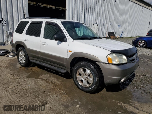 2003 Mazda Tribute LX with VIN 4F2CZ94133KM19916, listed as a Copart auction lot 73718284 with 151,644 mi miles and Salvage Title. Bid and sale history available at DreamBid. Image 4.