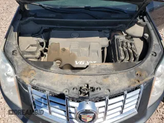 2016 Cadillac SRX Luxury Collection with VIN 3GYFNBE37GS556832, listed as a Copart auction lot 71701164 with 118,871 mi miles and Salvage title. Bid and sale history available at DreamBid. Image 12.