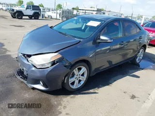 2014 Toyota Corolla L with VIN 5YFBURHE5EP005970, listed as a IAAI auction lot 42131661 with 115,840 mi miles and . Bid and sale history available at DreamBid. Image 18.