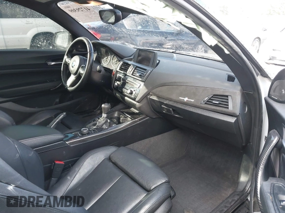 2015 BMW 2 Series 228i with VIN WBA1F5C55FV343662, listed as a IAAI auction lot 41729309 with 90,770 mi miles. Bid and sale history available at carsss.com. Image 5.