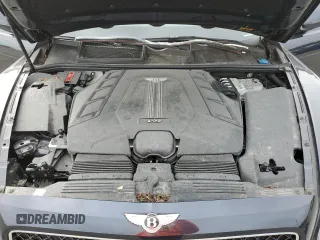 2019 Bentley Bentayga V8 z VIN SJAAM2ZV6KC025300, wystawiony jako Copart lot #81313854 z przebiegiem 2 982 mil mil oraz Szkoda całkowita • Salvage title. Historia ofert i sprzedaży dostępna na DreamBid. Obrazek 12.