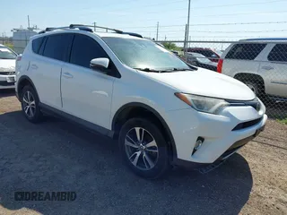 2018 Toyota RAV4 XLE z VIN 2T3WFREV5JW430122, wystawiony jako IAAI lot #42233828 z przebiegiem 74 271 mil mil oraz . Historia ofert i sprzedaży dostępna na DreamBid. Obrazek 1.