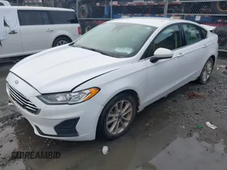 2020 Ford Fusion SE z VIN 3FA6P0HD8LR160330, wystawiony jako IAAI lot #42348552 z przebiegiem 95 610 mil mil oraz . Historia ofert i sprzedaży dostępna na DreamBid. Obrazek 2.