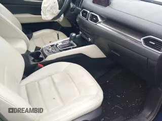 2019 Mazda CX-5 Grand Touring with VIN JM3KFBDM8K1521231, listed as a IAAI auction lot 42738963 with 32,179 mi miles and . Bid and sale history available at DreamBid. Image 5.