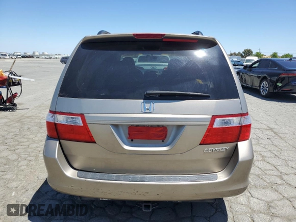 2005 Honda Odyssey EX-L with VIN 5FNRL38625B045152, listed as a Copart auction lot 57633005 with 145,776 mi miles and Salvage title. Bid and sale history available at DreamBid. Image 6.
