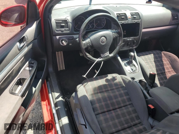 2006 Volkswagen GTI z VIN WVWFV71KX6W070213, wystawiony jako Copart lot #63465354 z przebiegiem 209 498 mil mil oraz Nie do naprawy • Non repairable. Historia ofert i sprzedaży dostępna na DreamBid. Obrazek 8.