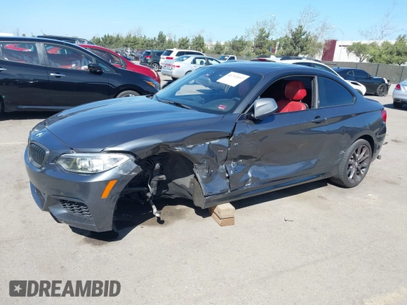 2014 BMW 2 Series M235i with VIN WBA1J7C51EVX33702, listed as a IAAI auction lot 41713337 with 83,076 mi miles. Bid and sale history available at carsss.com. Image 6.