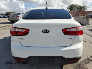 2014 Kia Rio LX with VIN KNADM4A35E6346018, listed as a Copart auction lot 85544104 with 76,455 mi miles and Salvage Title. Bid and sale history available at carsss.com. Image 6.