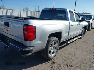 2018 Chevrolet Silverado 1500 LT with VIN 1GCRCREC0JZ212383, listed as a IAAI auction lot 41749534 with 45,777 mi miles and . Bid and sale history available at DreamBid. Image 4.