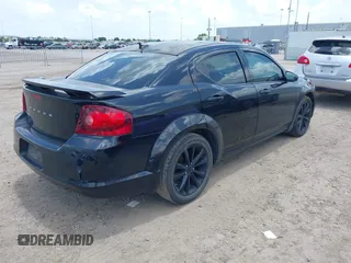 2014 Dodge Avenger SE with VIN 1C3CDZAG3EN104594, listed as a IAAI auction lot 42561392 with 129,208 mi miles and . Bid and sale history available at DreamBid. Image 4.