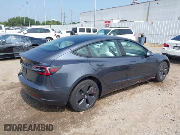 2023 Tesla Model 3 z VIN 5YJ3E1EAXPF414646, wystawiony jako IAAI lot #39514743 z przebiegiem 10 529 mil mil oraz . Historia ofert i sprzedaży dostępna na DreamBid. Obrazek 4.