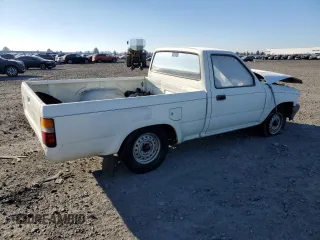 1990 Toyota Pickup with VIN JT4RN81R1L0049863, listed as a Copart auction lot 42832405 with 230,913 mi miles and Salvage title. Bid and sale history available at DreamBid. Image 3.