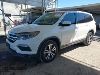 2018 Honda Pilot EX-L with VIN 5FNYF5H54JB009785, listed as a IAAI auction lot 41667784 with 67,296 mi miles. Bid and sale history available at carsss.com. Image 17.