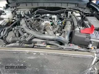 2022 Ford Bronco z VIN 1FMEE5DP7NLA95914, wystawiony jako Copart lot #65802685 z przebiegiem 50 918 mil mil oraz Szkoda całkowita • Salvage title. Historia ofert i sprzedaży dostępna na DreamBid. Obrazek 14.