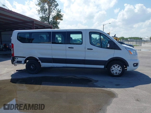 2020 Ford Transit Passenger XL z VIN 1FBAX2Y89LKA23229, wystawiony jako IAAI lot #41937635 z przebiegiem 83 536 mil mil oraz . Historia ofert i sprzedaży dostępna na DreamBid. Obrazek 13.