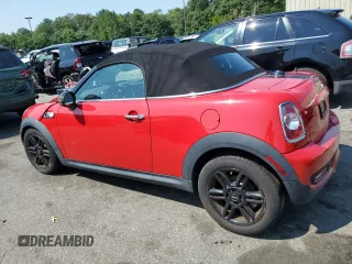 2013 MINI Roadster S z VIN WMWSY3C58DT594039, wystawiony jako Copart lot #65833804 z przebiegiem Nie podano mil oraz Szkody całkowita. Historia ofert i sprzedaży dostępna na DreamBid. Obrazek 2.