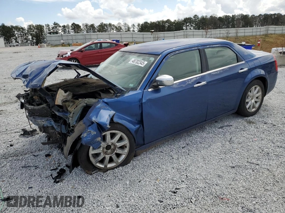 2009 Chrysler 300 LX with VIN 2C3KA43D29H581073, listed as a Copart auction lot 48702345 with 142,917 mi miles and Salvage Title. Bid and sale history available at carsss.com. Image 1.