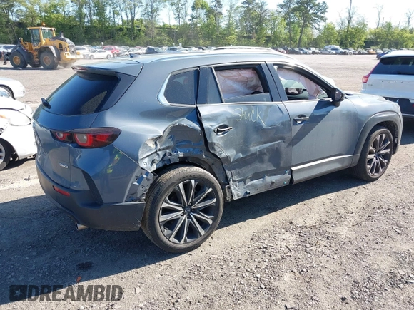 2023 Mazda CX-50 S Premium Plus with VIN 7MMVABEM8PN108020, listed as a IAAI auction lot 42203568 with 26,783 mi miles and . Bid and sale history available at DreamBid. Image 6.