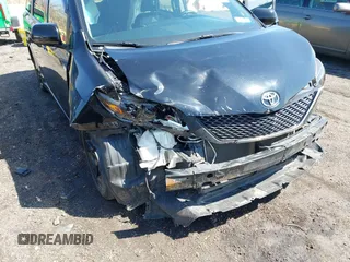 2015 Toyota Sienna SE with VIN 5TDXK3DC4FS581586, listed as a IAAI auction lot 41893274 with 263,577 mi miles. Bid and sale history available at carsss.com. Image 6.