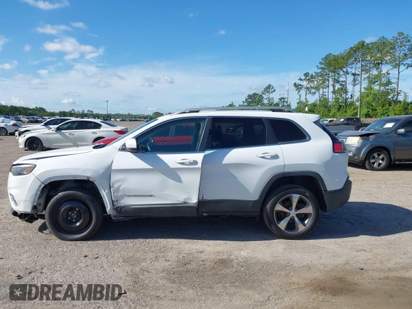 2019 Jeep Cherokee Limited z VIN 1C4PJLDB1KD380924, wystawiony jako IAAI lot #42621908 z przebiegiem 136 231 mil mil oraz . Historia ofert i sprzedaży dostępna na DreamBid. Obrazek 14.