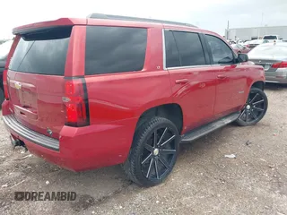 2015 Chevrolet Tahoe LT with VIN 1GNSCBKC1FR721605, listed as a IAAI auction lot 42184896 with 200,983 mi miles and . Bid and sale history available at DreamBid. Image 4.