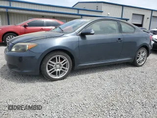 2006 Scion tC z VIN JTKDE177160113579, wystawiony jako Copart lot #56599195 z przebiegiem 121 701 mil mil oraz Tytuł czysty. Historia ofert i sprzedaży dostępna na DreamBid. Obrazek 1.