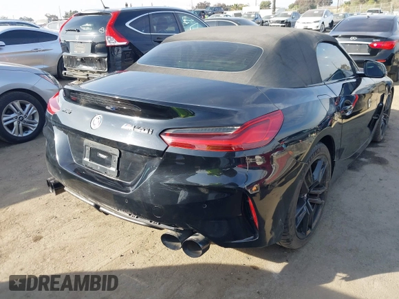 2022 BMW Z4 sDriveM40i with VIN WBAHF9C08NWX38258, listed as a IAAI auction lot 41462157 with 43,534 mi miles and . Bid and sale history available at DreamBid. Image 4.