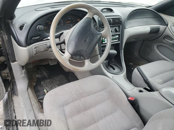 1997 Ford Mustang with VIN 1FALP4042VF198111, listed as a Copart auction lot 44245505 with 99,501 mi miles and Salvage Title. Bid and sale history available at carsss.com. Image 8.