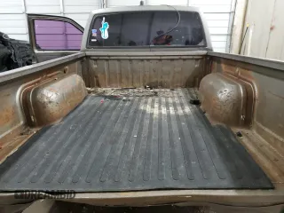 1987 Nissan Hardbody E z VIN JN6ND11S3HW057122, wystawiony jako Copart lot #73303004 z przebiegiem 233 309 mil mil oraz Szkody całkowita. Historia ofert i sprzedaży dostępna na DreamBid. Obrazek 10.