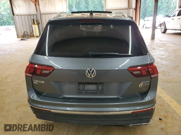 2021 Volkswagen Tiguan SE z VIN 3VV2B7AX6MM086605, wystawiony jako Copart lot #56351285 z przebiegiem 33 460 mil mil oraz Szkoda całkowita • Salvage title. Historia ofert i sprzedaży dostępna na DreamBid. Obrazek 6.