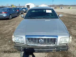 2006 Mercury Grand Marquis LS Premium z VIN 2MEHM75W56X605511, wystawiony jako IAAI lot #41642522 z przebiegiem 120 054 mil mil oraz . Historia ofert i sprzedaży dostępna na DreamBid. Obrazek 12.