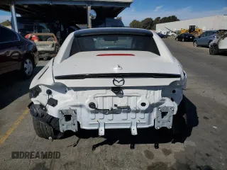 2024 Mazda MX-5 Miata Grand Touring z VIN JM1NDAM76R0602972, wystawiony jako Copart lot #77665904 z przebiegiem 4 965 mil mil oraz Szkoda całkowita • Salvage title. Historia ofert i sprzedaży dostępna na DreamBid. Obrazek 6.