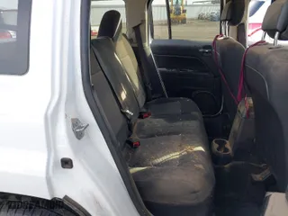 2015 Jeep Patriot Sport with VIN 1C4NJPBB2FD157427, listed as a IAAI auction lot 41819957 with 106,614 mi miles. Bid and sale history available at carsss.com. Image 8.