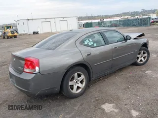 2010 Dodge Charger SXT with VIN 2B3CA3CV7AH165769, listed as a IAAI auction lot 42038135 with 200,886 mi miles. Bid and sale history available at carsss.com. Image 4.