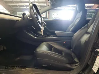 2018 Tesla Model 3 Long Range Battery z VIN 5YJ3E1EB4JF144295, wystawiony jako Copart lot #58754715 z przebiegiem 63 569 mil mil oraz Tytuł czysty. Historia ofert i sprzedaży dostępna na DreamBid. Obrazek 7.