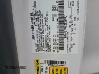 2020 Ford Fusion SE z VIN 3FA6P0T9XLR138977, wystawiony jako Copart lot #55260085 z przebiegiem 92 470 mil mil oraz Szkoda całkowita • Salvage title. Historia ofert i sprzedaży dostępna na DreamBid. Obrazek 13.