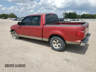 2001 Ford F-150 XLT with VIN 1FTRW076X1KC42302, listed as a Copart auction lot 59868295 with 234,772 mi miles and Salvage title. Bid and sale history available at DreamBid. Image 2.