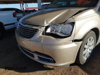 2012 Chrysler Town & Country Touring-L with VIN 2C4RC1CG7CR237270, listed as a IAAI auction lot 41858884 with 187,929 mi miles. Bid and sale history available at carsss.com. Image 6.