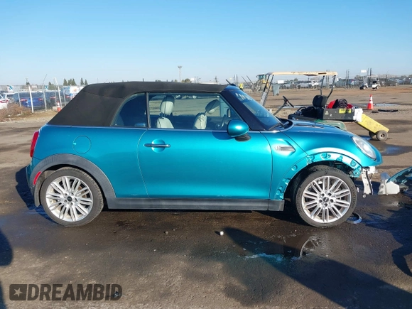 2016 MINI Convertible z VIN WMWWG5C50G3C19656, wystawiony jako IAAI lot #41429611 z przebiegiem 60 873 mil mil oraz . Historia ofert i sprzedaży dostępna na DreamBid. Obrazek 14.