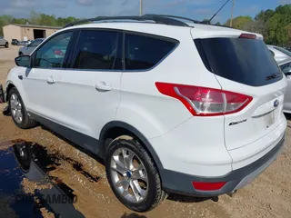 2013 Ford Escape SE with VIN 1FMCU0GX2DUB60296, listed as a IAAI auction lot 41955131 with 144,762 mi miles. Bid and sale history available at carsss.com. Image 3.