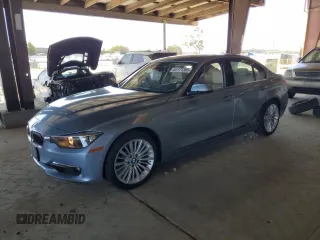 2013 BMW 3 Series 328i with VIN WBA3C1G51DNN93921, listed as a Copart auction lot 61171355 with 79,693 mi miles and Salvage title. Bid and sale history available at DreamBid. Image 1.