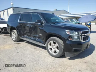 2015 Chevrolet Suburban LT with VIN 1GNSCJKC9FR732720, listed as a Copart auction lot 62564765 with 99,194 mi miles and Salvage title. Bid and sale history available at DreamBid. Image 4.