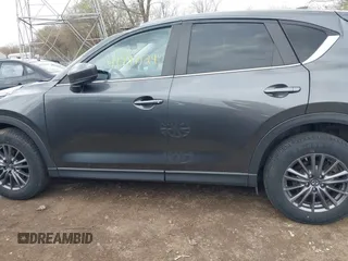 2020 Mazda CX-5 Touring with VIN JM3KFBCM1L0792396, listed as a IAAI auction lot 41949124 with 118,280 mi miles. Bid and sale history available at carsss.com. Image 14.