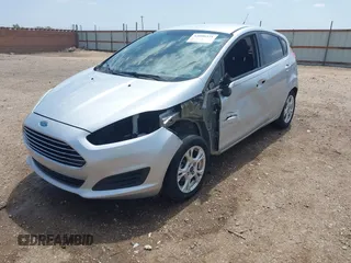 2014 Ford Fiesta SE with VIN 3FADP4EJ4EM151911, listed as a IAAI auction lot 42096321 with 129,938 mi miles and . Bid and sale history available at DreamBid. Image 2.