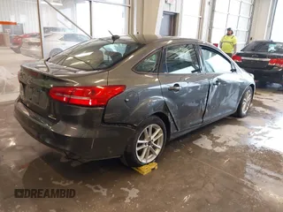 2016 Ford Focus SE with VIN 1FADP3F20GL234077, listed as a IAAI auction lot 41933546 with 106,184 mi miles and . Bid and sale history available at DreamBid. Image 4.