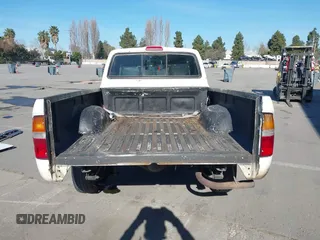 1998 Toyota Tacoma with VIN 4TANL42NXWZ117050, listed as a IAAI auction lot 41872096 with 333,863 mi miles. Bid and sale history available at carsss.com. Image 17.
