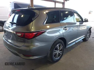 2019 Infiniti QX60 Luxe with VIN 5N1DL0MM8KC558679, listed as a IAAI auction lot 41973649 with 51,867 mi miles and . Bid and sale history available at DreamBid. Image 4.